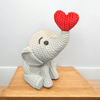 3-D printed knitted elephant with heart